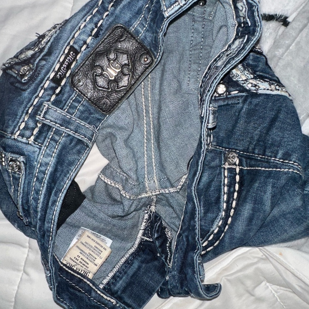 Miss Me Women's Blue Jeans with Peace Sign Embellishment - Picture 3 of 5